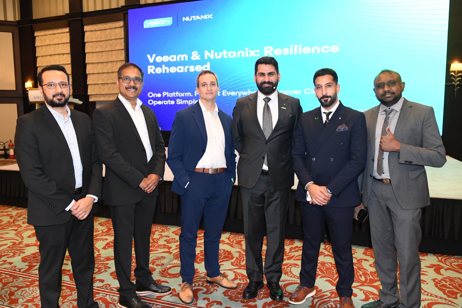 ACME, Veeam and Nutanix speakers group photo at the Resilience Without Compromise customer roundtable